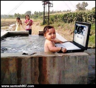 Kid playing with Laptop